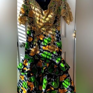 Green and orange butterfly print dress with beaded appliqué
